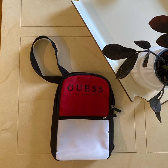 Mens Guess sling backpack - Picture 1 of 3
